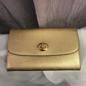 Rose gold coach purse